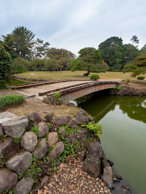 The elegant symmetry of the Formal Garden&rsquo;s flower beds leading to the historic greenhouse